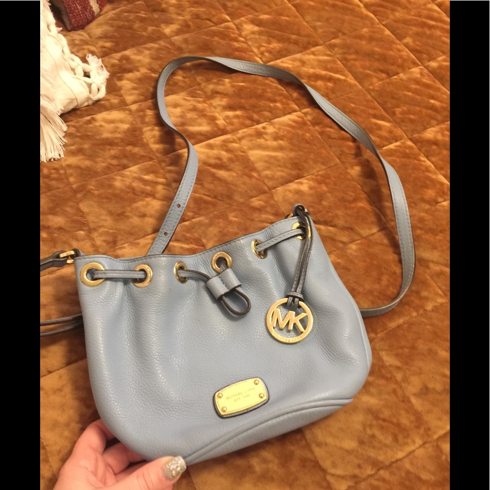 Baby blue Michael Kors bucket bag.